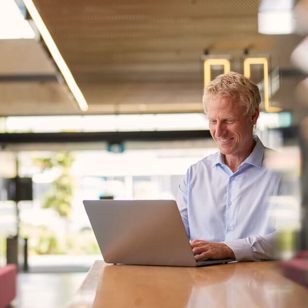 Man deep in focus working on laptop