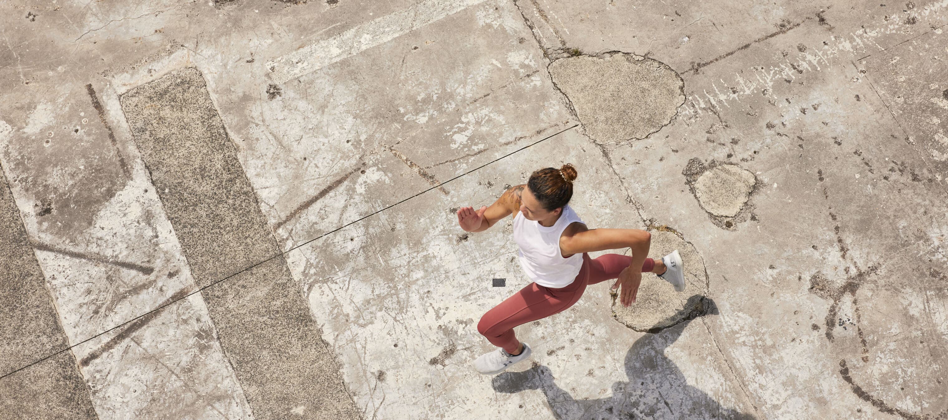 Woman running in city