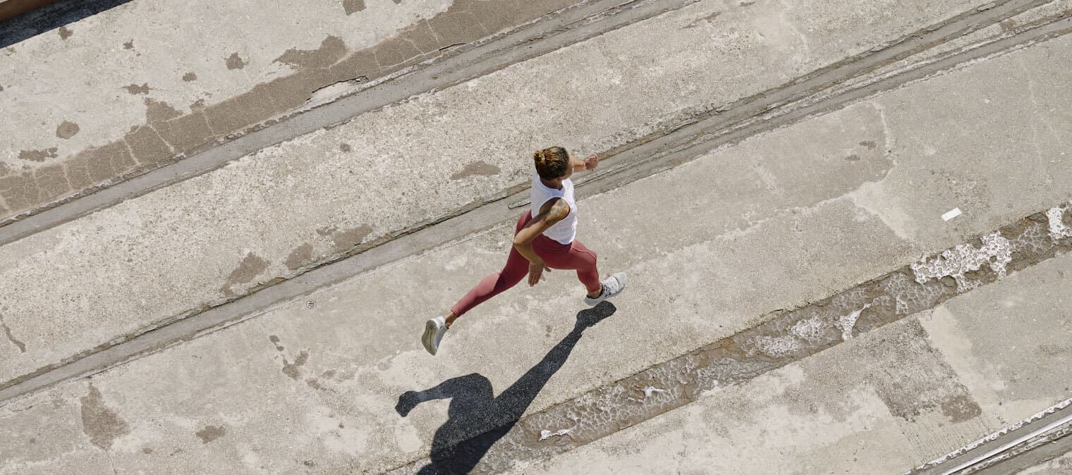 Woman sprinting outside