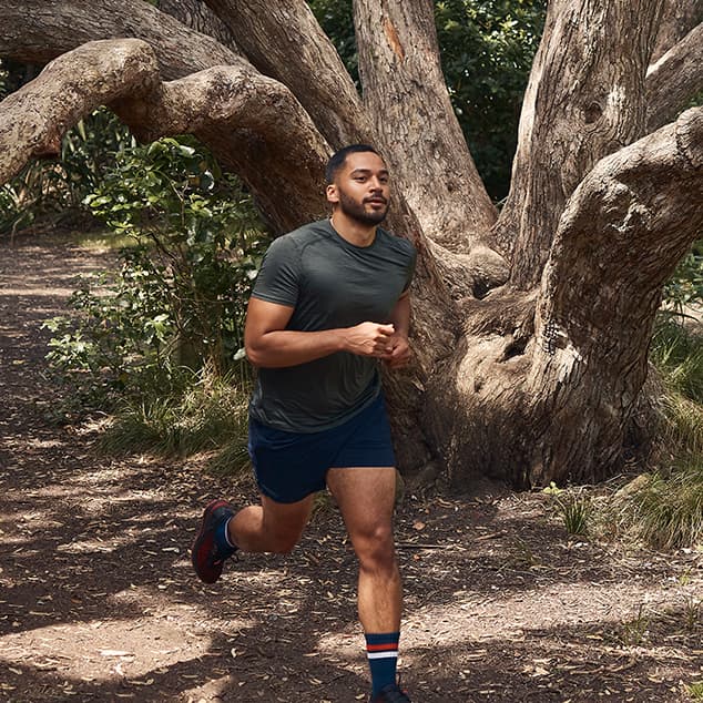man running off trail