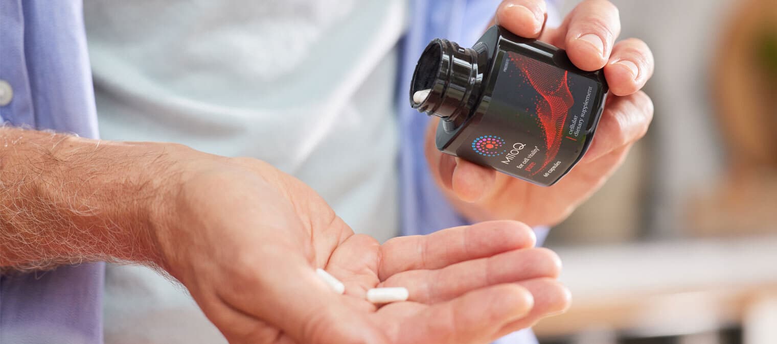 A man taking MitoQ Pure