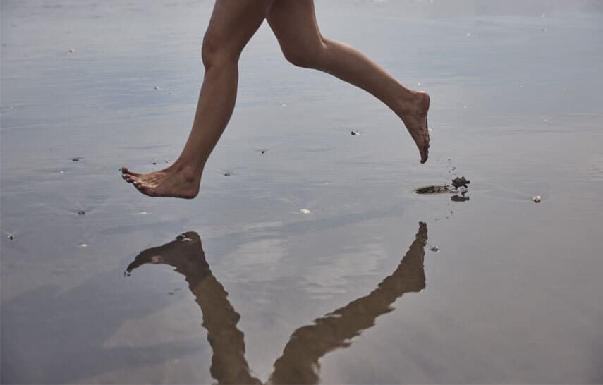 running on sand at the beach