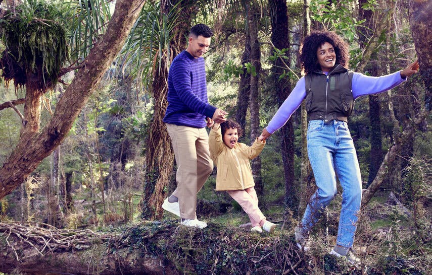 Family exploring a forest together